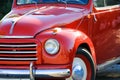 ROTHENBACH, GERMANY - OCTOBER 10. 2018: Close up of red shiny Fiat 500 classic cabriolet car