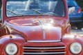 ROTHENBACH, GERMANY - OCTOBER 10. 2018: Close up of red shiny Fiat 500 classic cabriolet car