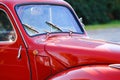 ROTHENBACH, GERMANY - OCTOBER 10. 2018: Close up of red shiny Fiat 500 classic cabriolet car