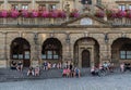 Rothenburg ob der Tauber, Bavaria - Germany : Tourists sitting on the stairs of the city hall in old town