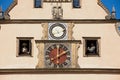 Famous medieval Meistertrunk mechanical clock at the historic town hall building in Rothenburg ob der Tauber, Germany.