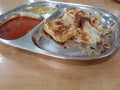 Roti Canai with Curries on a Metal Tray Royalty Free Stock Photo