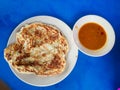 Roti canai with curry