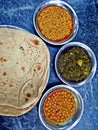 roti sabzi, chana and dal, typical vegetarian pakistani dish Royalty Free Stock Photo