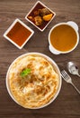 Roti Parata or Roti canai with lamb curry sauce