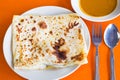 Roti Prata or Roti Canai, a traditional Indian bread served with curry Royalty Free Stock Photo