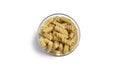 Rotini pasta in a glass jar isolated on a white background. Royalty Free Stock Photo