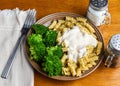 rotini top with parsley pepper and alfredo sauce