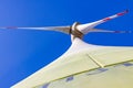 Rotor and blades of wind turbine with tower directly from below Royalty Free Stock Photo
