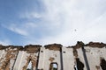 Rotten of an ancient brick wall and blue cloudy sky. Imagination concept Royalty Free Stock Photo