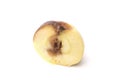 Rotten apple in a cut isolated on a white background Royalty Free Stock Photo