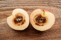 Rotten apple on wood background