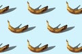 Rotten bananas on blue background Royalty Free Stock Photo