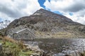 Rotten cottage at Ogwen valley with Llyn Ogwen in Snowdonia, Gwynedd, North Wales, UK - Great Britain, Europe