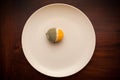 Rotten lemon on a plate