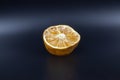 Rotten lime fruit on seen from above on a dark background Royalty Free Stock Photo