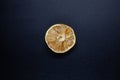 Rotten lime fruit on seen from above on a dark background Royalty Free Stock Photo