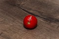 Rotten spoiled tomato on the table