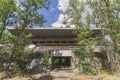 Rotten tribune on an abandoned football field