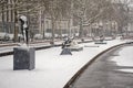 Rotterdam canal and sculptures in winter