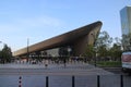 Rotterdam central station in the morning sun with lot if passengers arriving.