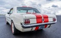 ROTTERDAM / NETHERLANDS - AUGUST 18 2019: Back view of a classic Ford Mustang 1965 on display at a classic car meeting Royalty Free Stock Photo
