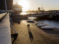 Rotterdam, the Netherlands - 2022-010-18: Couple enjoying a sunset stroll along the Rotterdam waterfront near the cruise terminal