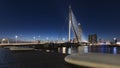 Rotterdam, the Netherlands - 2022-010-18: Erasmus brigde in Rotterdam at night during blue hour