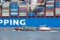 COSCO SHIPPING SCORPIO a large container ship lying in the harbour of Rotterdam with a