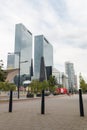 Modern architecture of Rotterdam office buildings, modern city high rise, tall towers and roof central station in forground Royalty Free Stock Photo