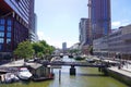 ROTTERDAM, NETHERLANDS - JUNE 9, 2022: Rotterdam cityscape with canal on sunny day, Netherlands