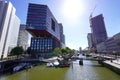 ROTTERDAM, NETHERLANDS - JUNE 9, 2022: Rotterdam cityscape with canal on sunny day, Netherlands
