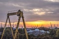 Residential building and harbour cranes Royalty Free Stock Photo