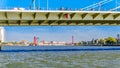 The Nieuwe Maas river with the red cable stayed Willems Bridge in the background viewed from under the Erasmus Bridge in Rotterdam Royalty Free Stock Photo