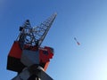 View on the historical red Figee harbor crane in Leuvehaven, Rotterdam