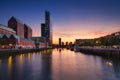 Rotterdam, Netherlands. View of the city center. Cove and pier for boats and ships. Panoramic view. Cityscape in the evening.