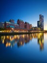 Rotterdam, Netherlands. View of the city center. Cove and pier for boats and ships. Panoramic view. Cityscape in the evening.