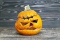 carved from pumpkin frightening face in mold and mildew during decomposition