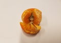 Rotting putrid inside of an orange citrus fruit Royalty Free Stock Photo