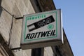 Rottweil waidmannsheil rws armurier gun gunsmith logo brand and text sign attached to