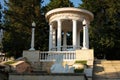 Rotunda, a beautiful white architectural structure with columns built in park. A well-equipped recreation area