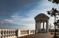 Rotunda on the central embankment of the city of Volgograd against a blue sky