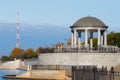 Rotunda on the embankment of the city of Blagoveshchensk, Russia in autumn 2021. Increased water level in the Amur River after the