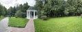 Rotunda in the park. Antique gazebo in the autumn Park.