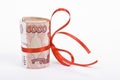 Roubles with red bow Royalty Free Stock Photo