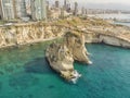 Rouche rocks in Beirut, Lebanon in the sea during daytime. Pigeon Rocks in Mediterranean sea.