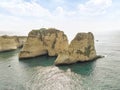 Rouche rocks in Beirut, Lebanon in the sea during daytime. Pigeon Rocks in Mediterranean sea.