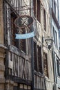 Rouen Normandy May 4th 2013 : Quaint cafe sign with a pewter mug Royalty Free Stock Photo