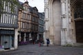 Rouen. Old and tilted houses at Rue Eau de Robec on a rainy day. Rue Eau-de-Robec is one of the main tourist streets of