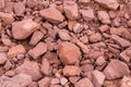 Rouge rock for road reclamation work. Laterite Pattern. lateritic soil textured background. Background of broken pottery. Cracked Royalty Free Stock Photo